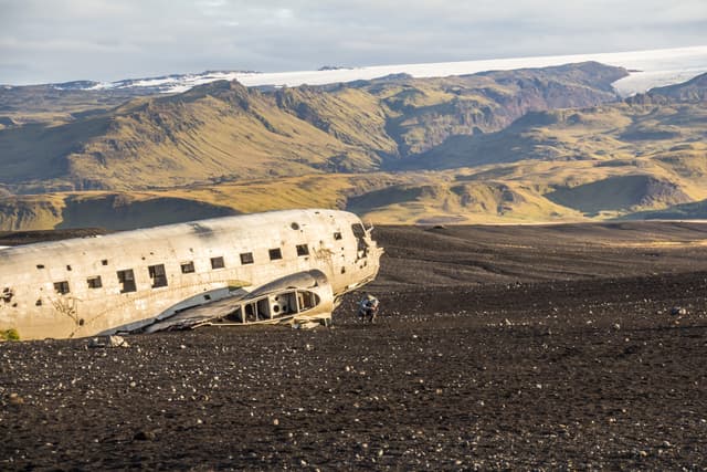 View on plane wreck DC-3 from far, Iceland View on plane wreck DC-3 from far, morning time, Iceland